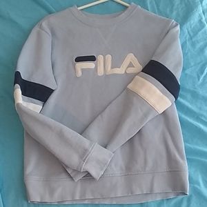 Long sleeve light baby blue shirt.